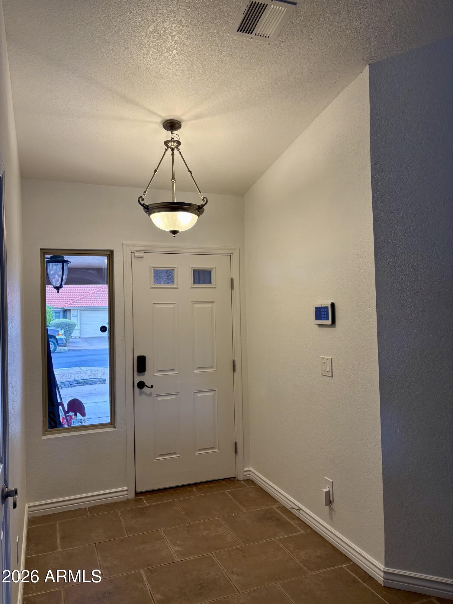 5829 E ENROSE Street