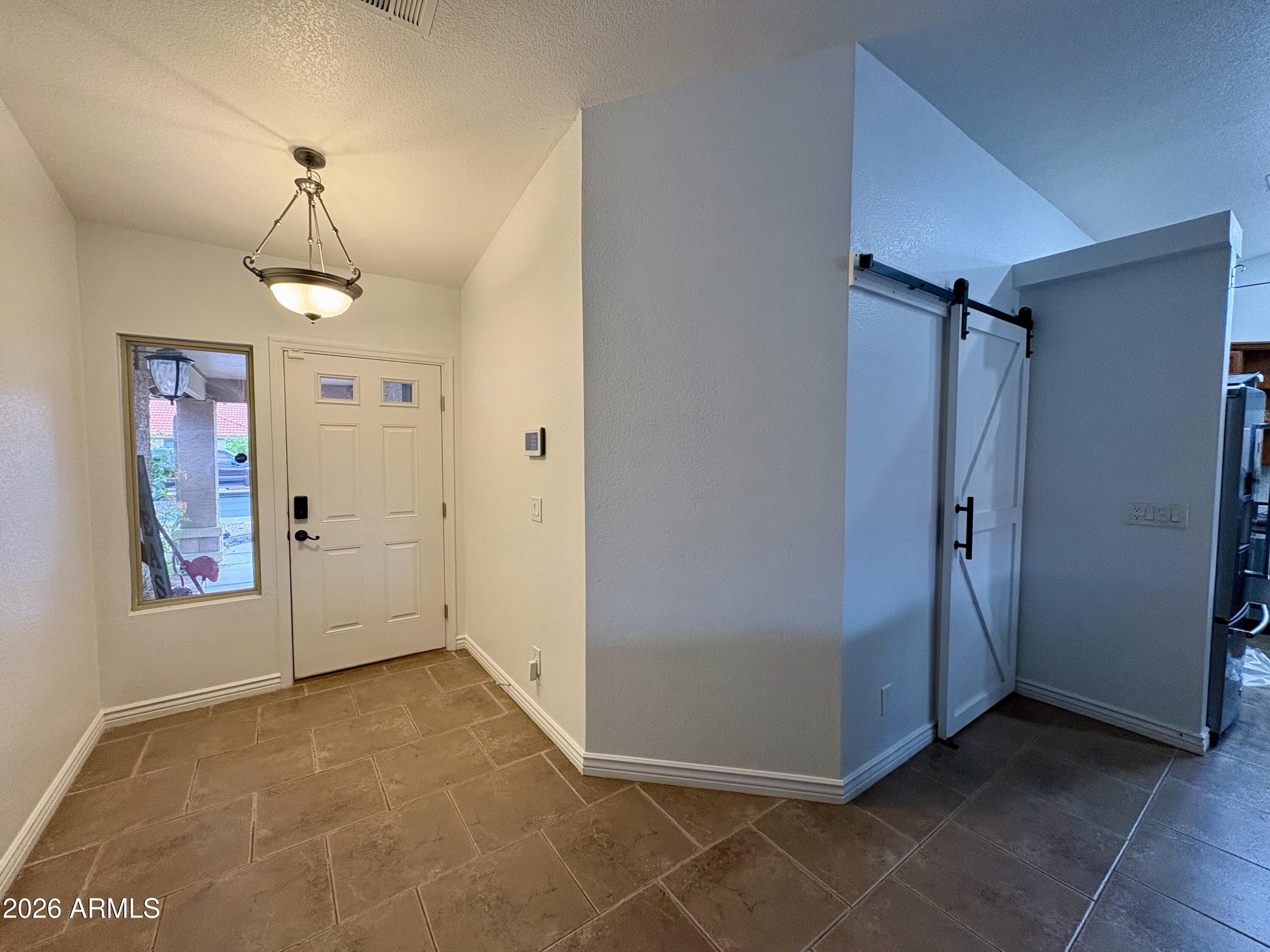 5829 E ENROSE Street