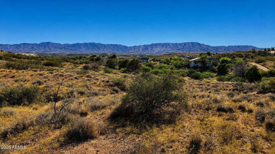 Build your dream home on this 3.66-acre view lot in Cornville's desirable Koch Ranch area, just minutes from Sedona and Cottonwood. Enjoy sweeping Mingus Mountain vistas and distant red rock views from multiple potential building sites, surrounded by natural high-desert landscape and custom homes on acreage. Primary access is from E Sienna Hills Dr with an additional recorded easement from E Cove Mesa Rd, giving flexible approach options and site-planning potential. Plenty of space for a custom residence, shop, RV parking or mini-ranch, subject to county approval.