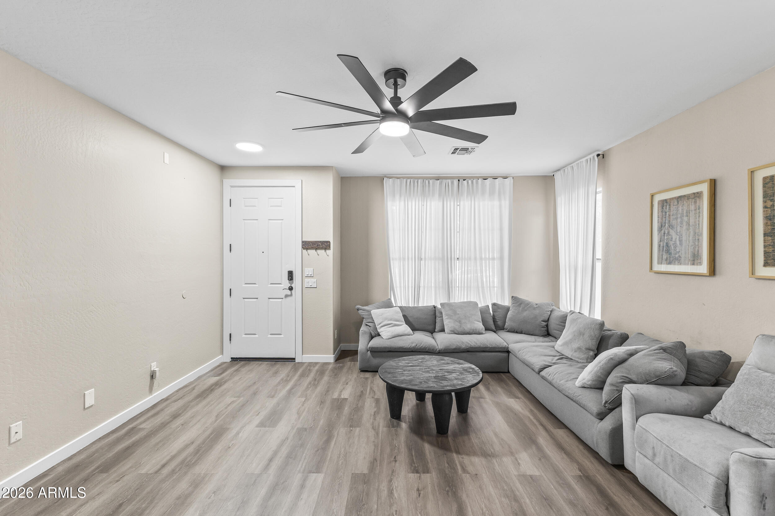 10203 W ALBENIZ Place