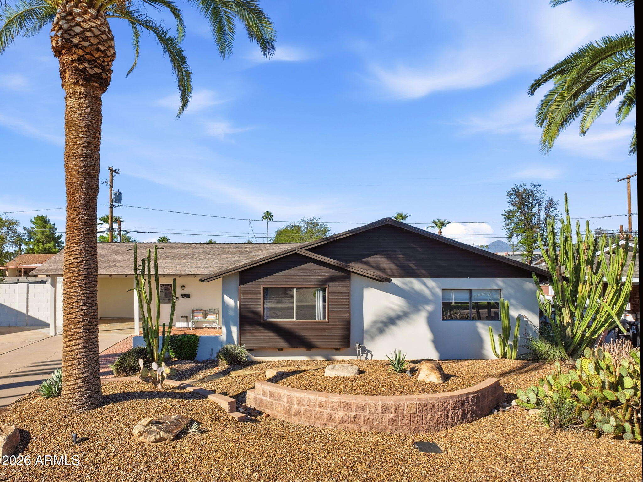 8702 E HIGHLAND Avenue