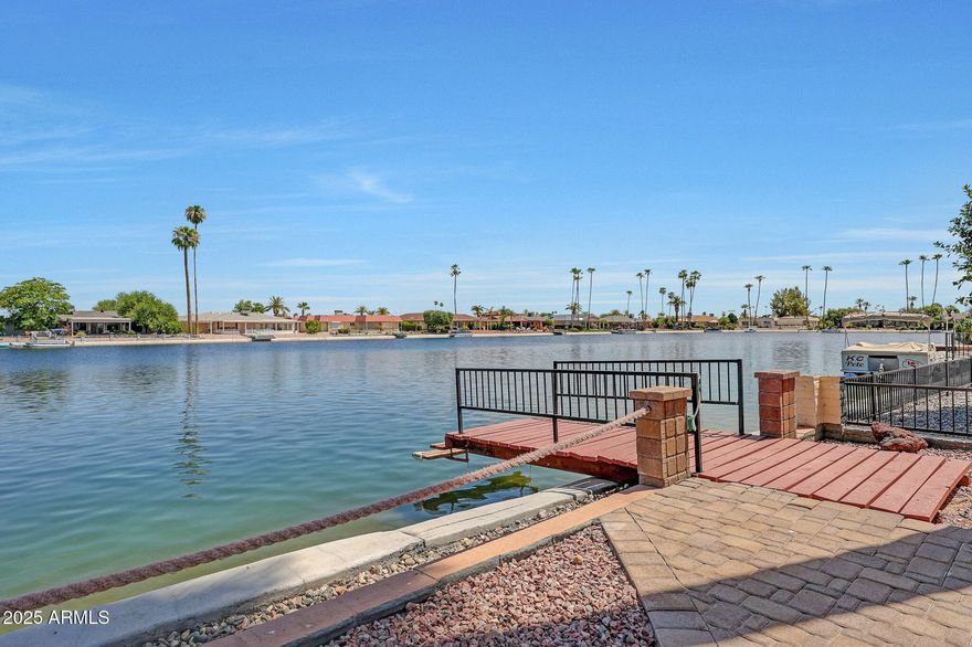 Located on a quiet cul-de-sac within Emerald Pointe, this lake-oriented home has been strategically repositioned, creating a compelling opportunity among current waterfront offerings.
From the moment you enter, the eye is drawn through the main living area to the water beyond, creating a natural indoor-outdoor flow ideal for entertaining or simply enjoying the lake setting. The backyard orientation allows for relaxing views and connection to the water. The home offers a solid foundation and presents an opportunity for updates and personalization, allowing a buyer to enhance the property to their taste while securing lake ownership in a desirable location. Residents enjoy access to Sun City's recreation centers, golf, clubs, and year-round active adult amenities.