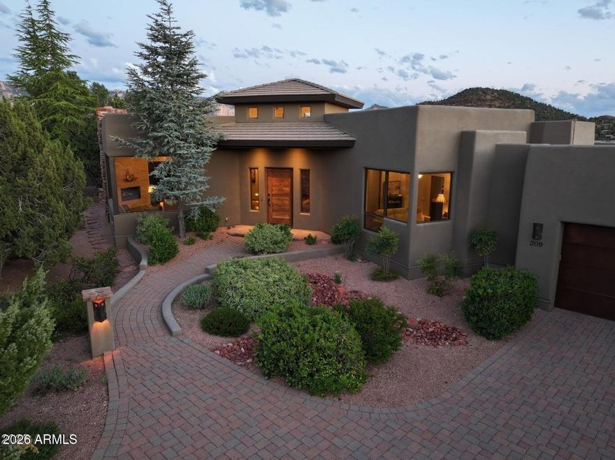 Timeless and elegant Soldiers Pass estate located in gated Casa Contenta. Exceptional quality and designer finishes throughout. Unparalleled panoramic views from nearly every room. Beautifully-located, backing to dedicated green space in a quiet cul de sac. This tranquil setting is surrounded by lush landscaping in the heart of the prestigious Soldiers Pass corridor. This sophisticated residence includes a gourmet kitchen, office/den, 3-car garage, and family room with kitchenette and guest bedrooms. This exclusive development provides pickleball, tennis, swimming pool, and spacious clubhouse. Incredible remodel in 2020.