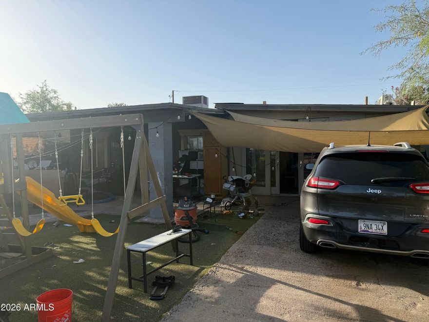 Great opportunity for an investor or buyer looking to add their personal touch! This livable home features a renovated kitchen but needs TLC and updating throughout. 
The property includes a livable RV with two wall A/C units and a detached bonus room with its own bathroom and wall A/C, ideal for a home office, guest space, or possible extra income. RV gate access available through the alley. Mature plants add charm to the front yard.
Plenty of potential and flexible use options for the right buyer! House sold as is no repairs.
