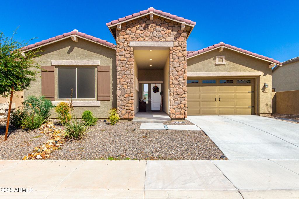 Photo of 18522 W Thistle Landing Drive, Goodyear, AZ 85338 (MLS # 6929346)