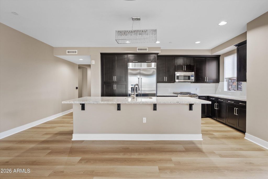 Photo of 4805 N Woodmere Fairway #1002, Scottsdale, AZ 85251 (MLS # 6976298)