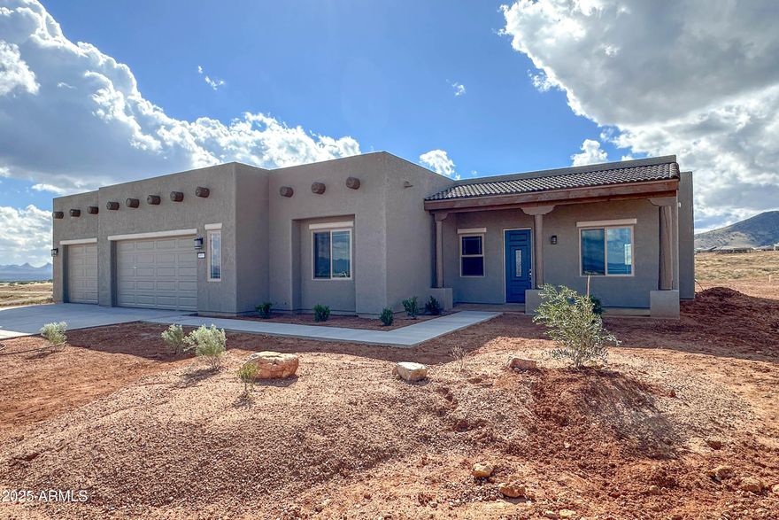 Enjoy stunning views from this 3br/2ba 2278sqft home on over 2.6 acres in the popular Kings Ranch community. Featuring 8x36 wood-look plank tiles, 42'' maple cabinetry with soft close doors and drawers and pot drawers, granite countertops, along with a 36'' cooktop, wall oven and microwave, and vent hood. Upgraded carpet and pad in bedrooms. Bath Vanities at executive height, rectangle undermount sinks, bench in primary shower. Don't miss out on several other custom features like 16' sliding door in Living room and patio access from primary bedroom- truly a must see! Environments for Living Certified home.