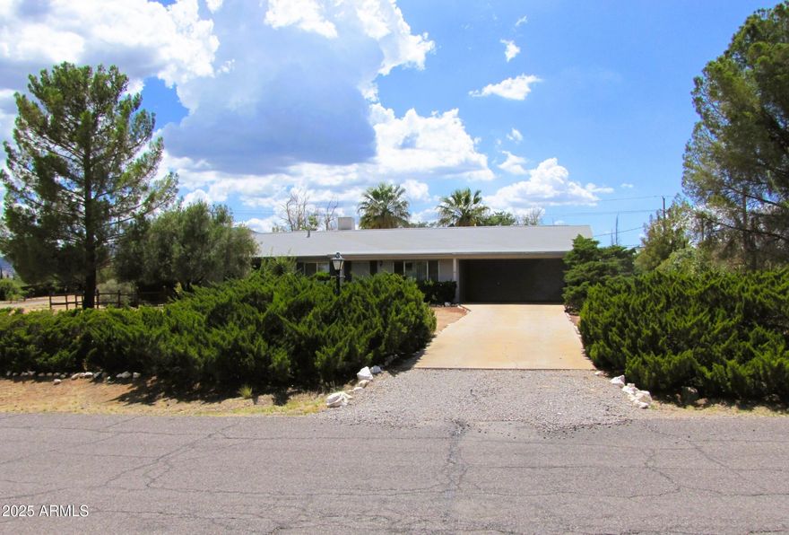 This well-maintained, 4BR/2BA/2CP, 2139 sq.ft. on 1.194 acres in Sierra Vista, AZ is minutes from Ft. Huachuca, shopping, schools and Canyon Vista Medical Center. The home includes a large living area, central A/C and an Arizona room, The backyard has a lawn and a garden area with views of the Huachuca Mountains.