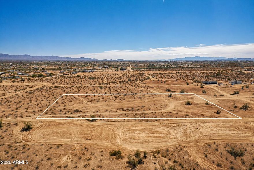 Come see this incredible 3.29 acre parcel in Tonopah, AZ, ideal for a small home builder, investor, or a custom estate on acreage. Seller is offering INCREDIBLE Seller Financing terms!! This property is easily buildable, has wide-open desert beauty and stunning mountain views, & brand-new homes currently being built throughout the surrounding area. Enjoy convenient access through paved roads through the Buckeye Ranch subdivision, making this parcel easily reachable while still providing privacy and space. The property can be split into three 1-acre lots, creating excellent development or resale potential. APS power is in progress to be extended to the property line, and a newly installed gravel road provides ideal access for future homes