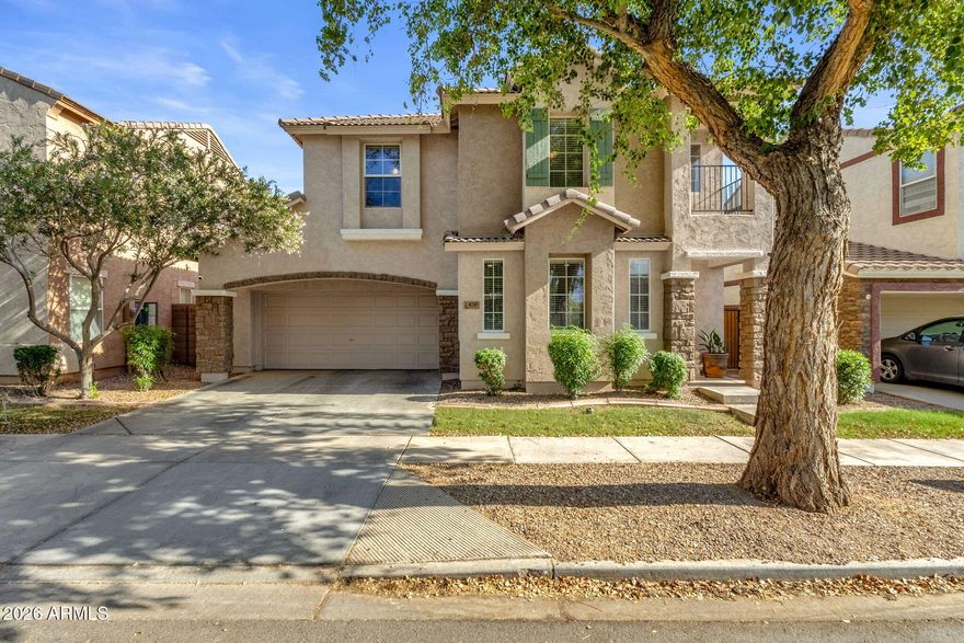 BONUS! Paid Off Solar with full price offer! Beautifully maintained 4-bedroom, 2.5-bath home on a premium lot backing to an open common area with added privacy and mature landscaping! This move-in ready two-story home features tile flooring throughout the main level, upgraded baseboards and crown molding, granite countertops, modern lighting, and spacious open living areas. The primary suite offers walk-in closets and an updated ensuite bath. Energy-efficient upgrades include a solar system*, variable speed A/C, and recently cleaned and sealed ductwork. Enjoy smart home features with WiFi-enabled front door lock, thermostat, and garage door opener. The backyard offers a travertine patio, outdoor fireplace, drip irrigation, propane pre-plumb for a future BBQ island, and space to create your dream outdoor retreat. Located near Upscale shopping at SanTan Mall, Verde at Cooley Station, Epicenter Gilbert and Coming Soon Bella Storia.  Conveniently located within 2.5 miles of Mesa Gateway Airport and the ASU Polytechnic campus.