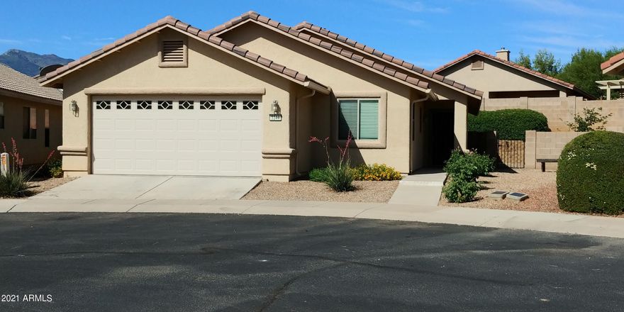 This super cute home is ready for new owners! Brand new carpet and professionally cleaned, this home is in move in condition. There is a lovely breakfast room off of the kitchen as well as a breakfast bar. There is a large living room that opens out to the backyard. There you will enjoy the covered patio, firepit and low maintenancce landscape. Back inside, the bedrooms feel very spacious and there are ceiling fans thru out. The master bedroom has dual walk in closets and a wonderful large shower with seat. You will not want to miss this special home!