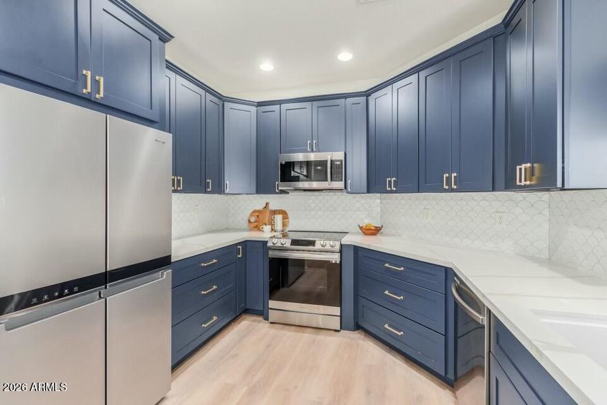 *Please see Staged Photos*
*$45,000 Plus in Upgrades in 2024. New floors/Appliances, Fixtures & Expanded Shower Etc. A one-story townhome with two bedrooms and two full bathrooms available in a small community of 68 units. This townhome boasts a split floor plan and has a  close by located Community pool and spa. The property also features ceiling fans and fire sprinklers throughout. The spacious layout includes a generous living room, dining area, and a kitchen with ample cabinet and counter space. A private  outdoor Patio. The Primary Bedroom is highlighted by New dual sinks  & Shower in the bathroom and a substantial walk-in closet. Conveniently situated as an end unit, this home is strategically located near popular shopping, restaurants and sports venues.  *Don't Miss  this one*