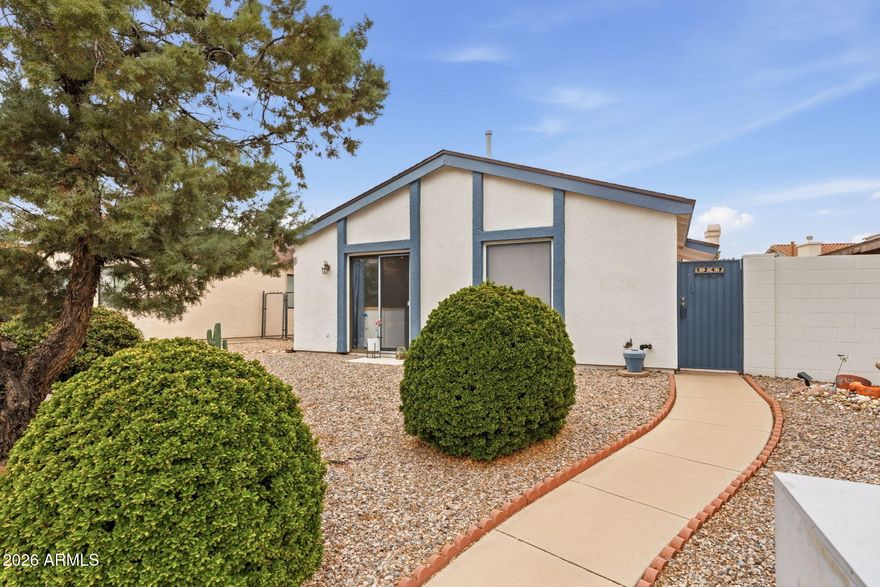 Enchanting, well maintained 2 Bed/2Bath home in the desirable Desert Shadows community.  Vaulted ceilings open the living space,  2 sliding glass doors in the main living areas let in lots of natural light and mountain views. Entire exterior recently painted, New Roof 2025, updated hall bathroom shower and kitchen countertops.
Enjoy summer nights in the private large side & back or the, covered patio off of the bedroom, which also leads to an outside storage closet and shed.  2 car garage is a plus! .Community pool/spa and park are close by.  Come see this gem before it is gone!
