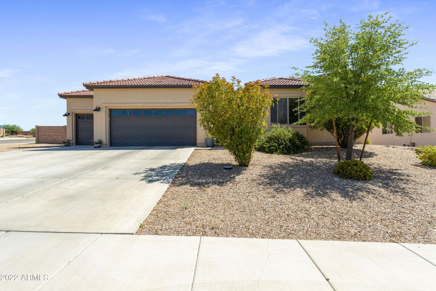 Welcome Home! This 5 bedroom 3 bath home has all the space you need. Sitting on a corner lot in the highly desired neighborhood of Coronado Crossings. Everything in this home is beautifully finished from the kitchen to the bathrooms to the tile floors throughout. Bedrooms are split floor plan style. Living, dining and kitchen are extra spacious open concept.  Exterior of home has recently been painted. Backyard has GRASS (in Arizona) Everything about this house screams HOME!