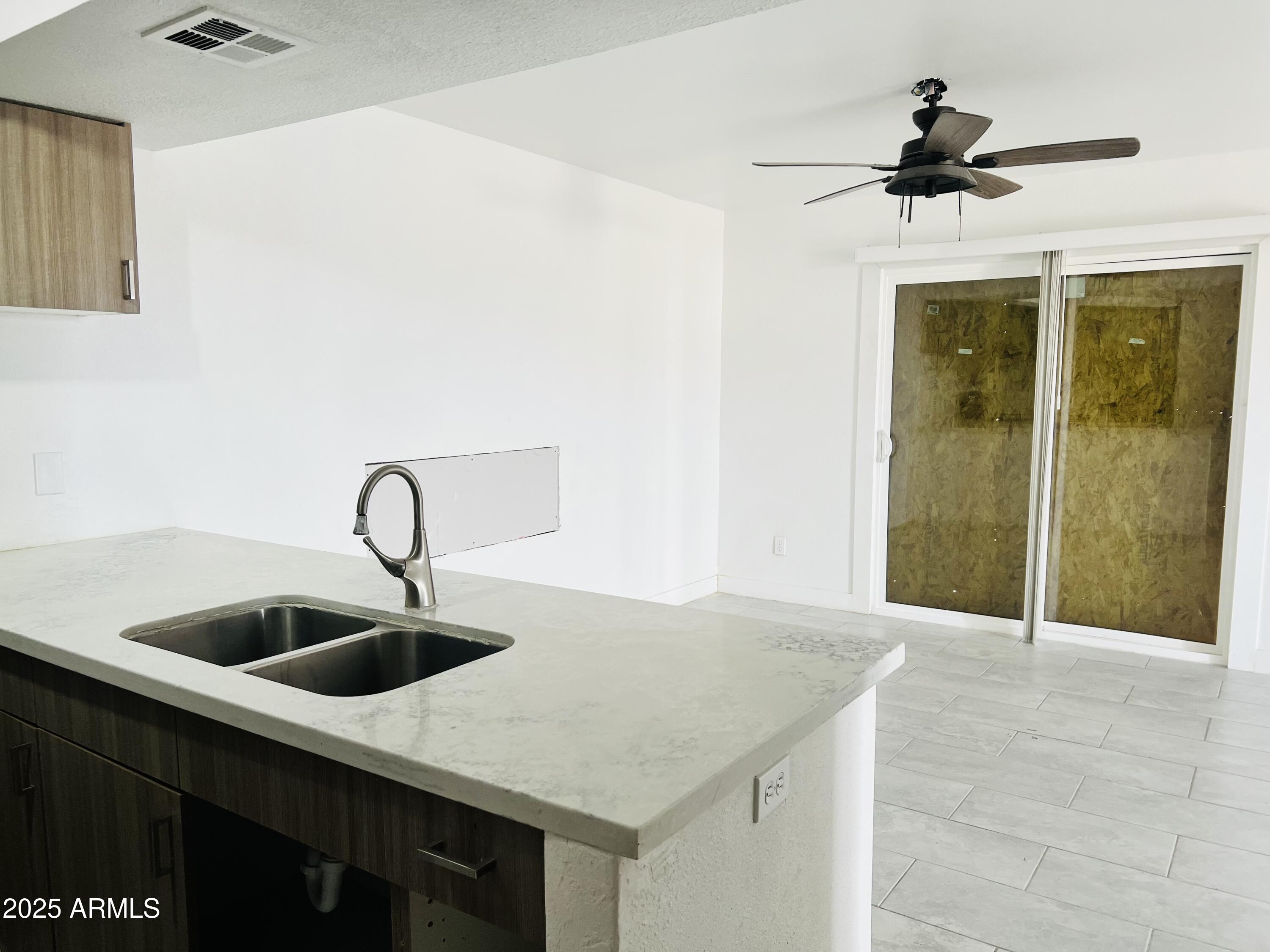 Homes 2 4242 N 69TH Drive 1303