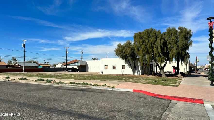 LOT ON MAIN STREET IN FLORENCE ARIZONA! SELLER WILL CARRY WITH $25k DOWN. MOTIVATED SELLER! THE OWNER HAS MULTIPLE PROPERTIES IN THE REGION. BE IN THE MIDDLE OF PINAL COUNTY'S LONG TERM GROWTH STORY! INQUIRE FOR MORE INFORMATION. PRICED FOR A QUICK SALE. BUYER TO VERIFY SCHOOLS, ZONING / USE, UTILITIES, BUILDABILITY AND ALL PERTINENT INFORMATION. ALL INFORMATION DEEMED ACCURATE BUT NOT GUARANTEED. SUBMIT ALL OFFERS! OWNER/AGENT