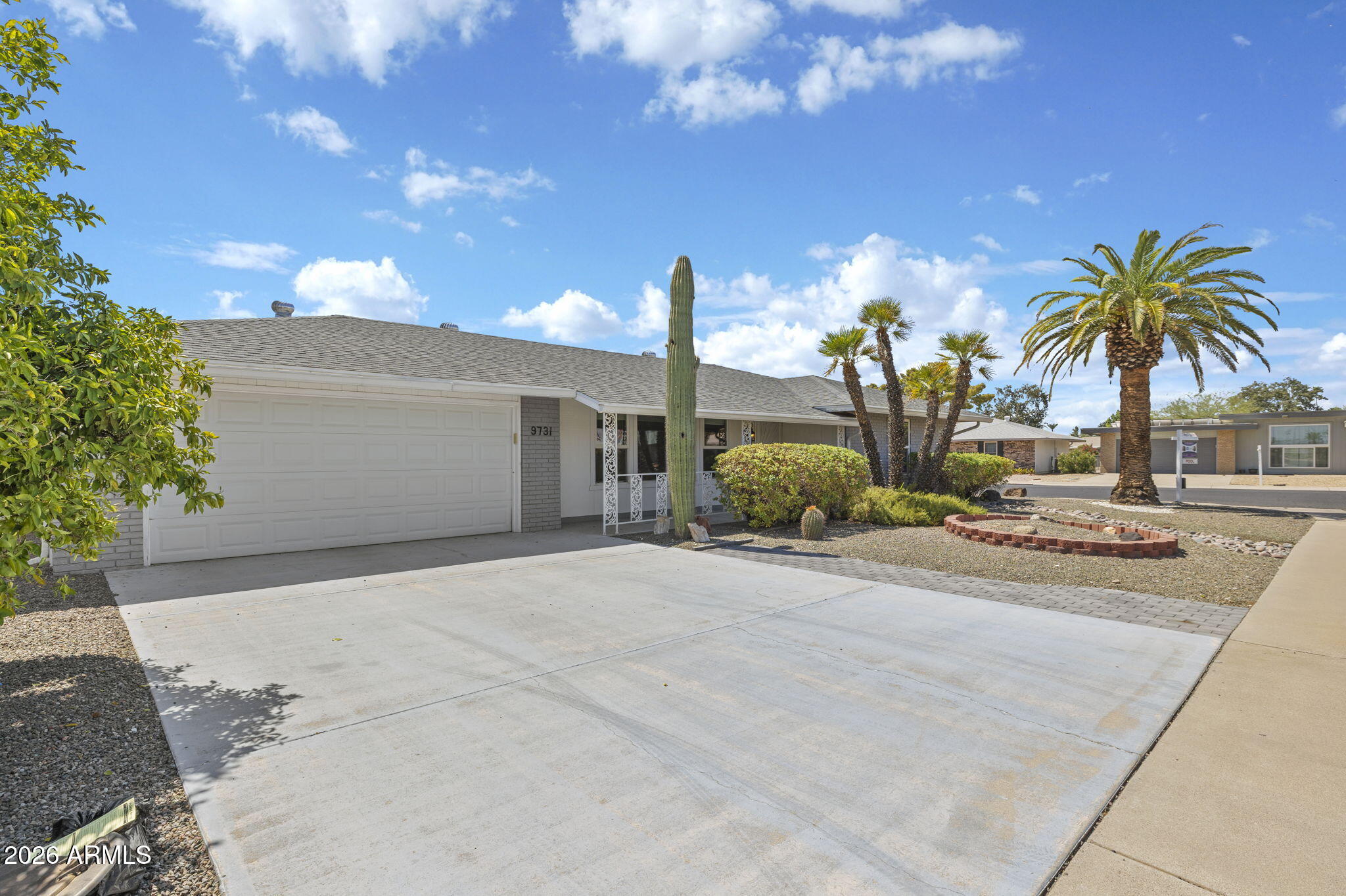 9731 W BROKENSTONE Drive