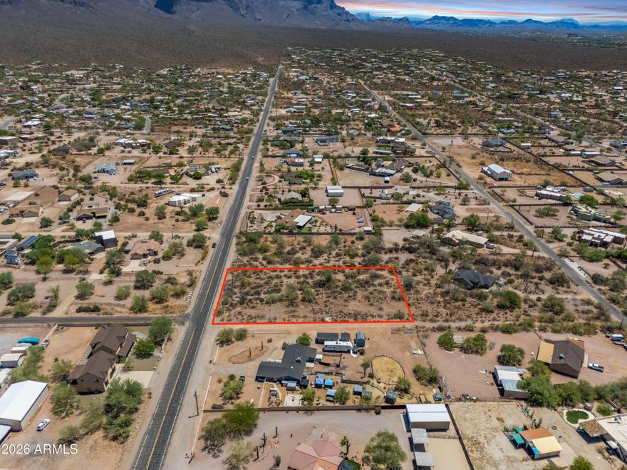 NO BANK QUALIFYING - ¡SIN CALIFICACIÓN BANCARIA! OWNER FINANCING AVAILABLE. Rare 1.058-acre residential parcel with BREATHTAKING Superstition Mountain views! Paved road access with MLD Boundary Survey available. Water nearby via AZ Water Co (servicing neighboring properties) and power close by through SRP.

Zoned CR-1A for site-built homes, including tiny homes. NO HOA! Bring your RVs, animals, toys, and build your dream setup with room for a shop, casita, pool, or additional garage space. Peaceful desert setting with easy access to city conveniences and main roads. Ideal for full-time living, investment, or a private desert retreat.

SELLER FINANCING AVAILABLE / ¡EL VENDEDOR FINANCIA!