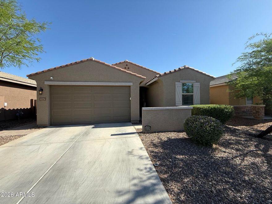 Discover this beautifully designed 3-bedroom home nestled in the desirable Tierra Montana community! From the moment you step inside, you'll appreciate the bright and airy open-concept layout featuring elegant tile flooring, a calming modern color scheme, upgraded lighting, and expansive windows that fill the home with natural light.

The chef-inspired kitchen is equipped with premium stainless steel appliances, rich espresso cabinetry with crown molding, gorgeous quartz counters, a designer tile backsplash, and a spacious island perfect for entertaining family and friends.

Unwind in the inviting primary suite offering a generous walk-in closet and a luxurious ensuite bath complete with dual vanities. Step outside to your private backyard oasis showcasing a covered patio ideal for out dining and a sparkling pool ready for relaxing Arizona days. This exceptional home is the perfect blend of comfort, style, and functionality!