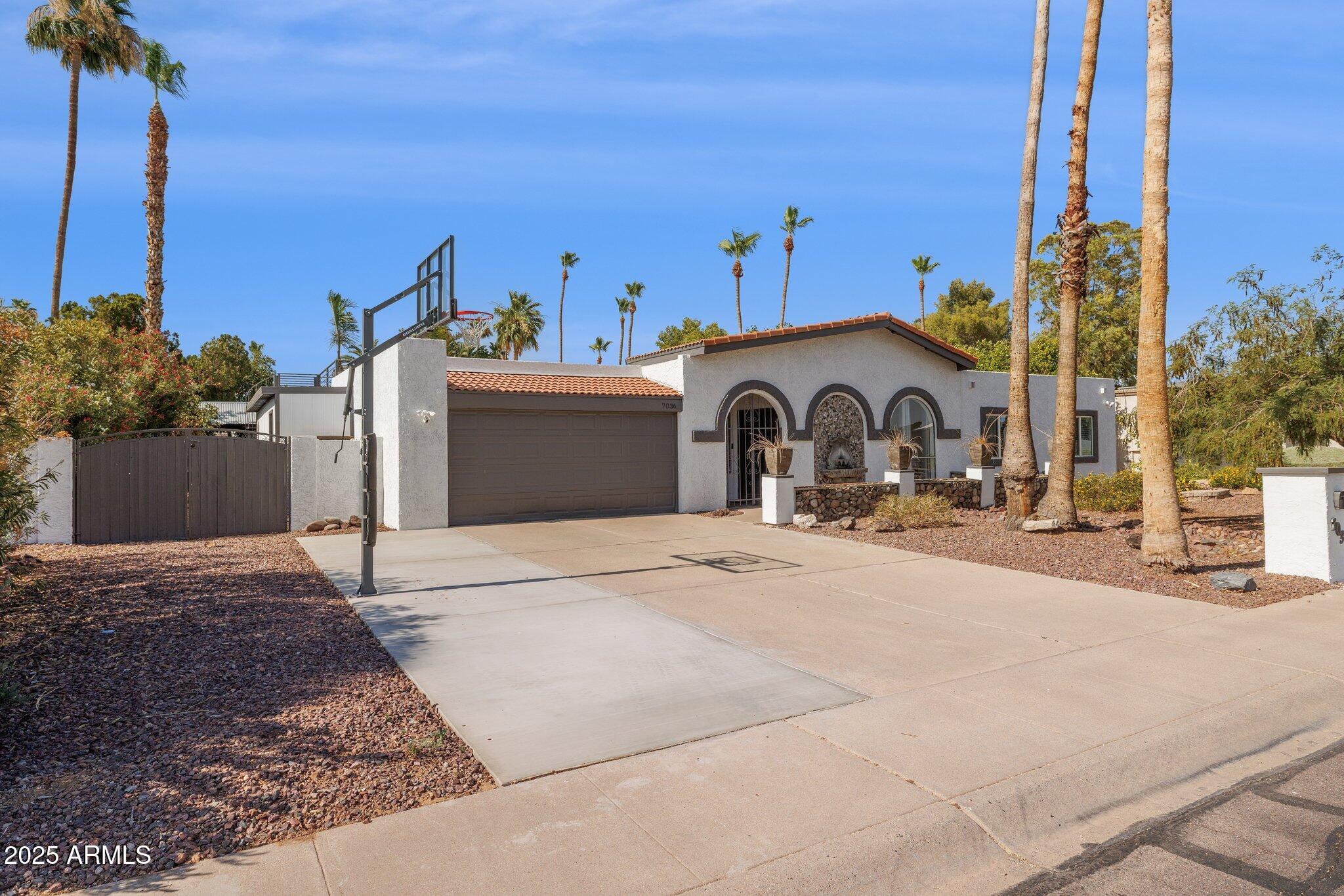 7036 E SHEENA Drive