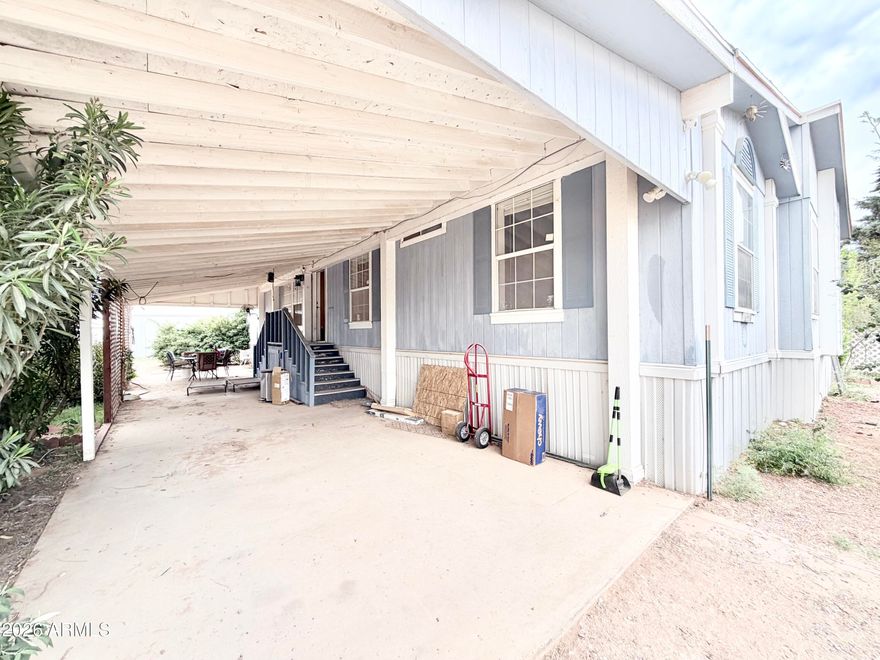 This beautifully updated home offers a range of recent upgrades designed for comfort, efficiency, and convenience. Enjoy a newer AC unit (2 years old), a brand-new water heater installed in 2025, and a refrigerator that's only 6 months old. High-traffic areas feature updated flooring completed in 2025, and the window units will convey with the sale. A standout feature is the leased solar system, helping reduce energy costs while providing reliable, sustainable power. The garage is equipped with 220-volt, currently set up as a Tesla charging station perfect for electric vehicle owners. Multiple sheds with electricity & lighting provide flexible space for storage, hobbies, or a workshop, while solar-powered motion lights add convenience and security throughout the property.
