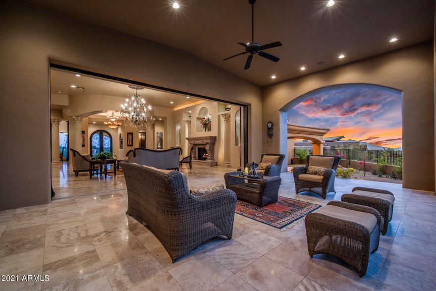 Exquisite Mediterranean home situated on a private and tranquil hilltop in the prestigious community of Gambel Quail of Desert Mountain. Custom built in 2007 to perfection with the finest finishes. This remarkable home boasts an open floor plan with a massive master suite, 3 en-suite guestrooms, 4.5 bathrooms, bonus/game room, dining room, gourmet kitchen, two kitchen islands, butler's pantry, a full bar, wine cellar, an elevator and multiple indoor and outdoor fireplaces. 
Upon entering the home you find yourself in dramatic foyer that opens to the colossal living room with spectacular views of mountains and manicured to perfection Renegade golf course. Oversized glass pocket doors lead to the 2000+ Sq Ft covered patio with BBQ, gazebo and 2 fireplaces overlooking the 18th fairway of golf course: making it a perfect place for entertaining or relaxing in serene beauty and peace. Grand master suite with luxurious bathroom features a steam room, dual head rain shower, jetted tub, and a large closet with custom cabinetry. Mountain, City lights and sensational sunset views from every window. 
Community offers endless amenities to it's residents including 7 Diverse Golf Courses, 7 Distinctive Club houses, 10 Restaurants and Grills, nine-Court Tennis Complex, Jim Flick Golf Performance Center, Dog Park, The Ranch and over 45 social clubs and activities. For more information please see the document tab.