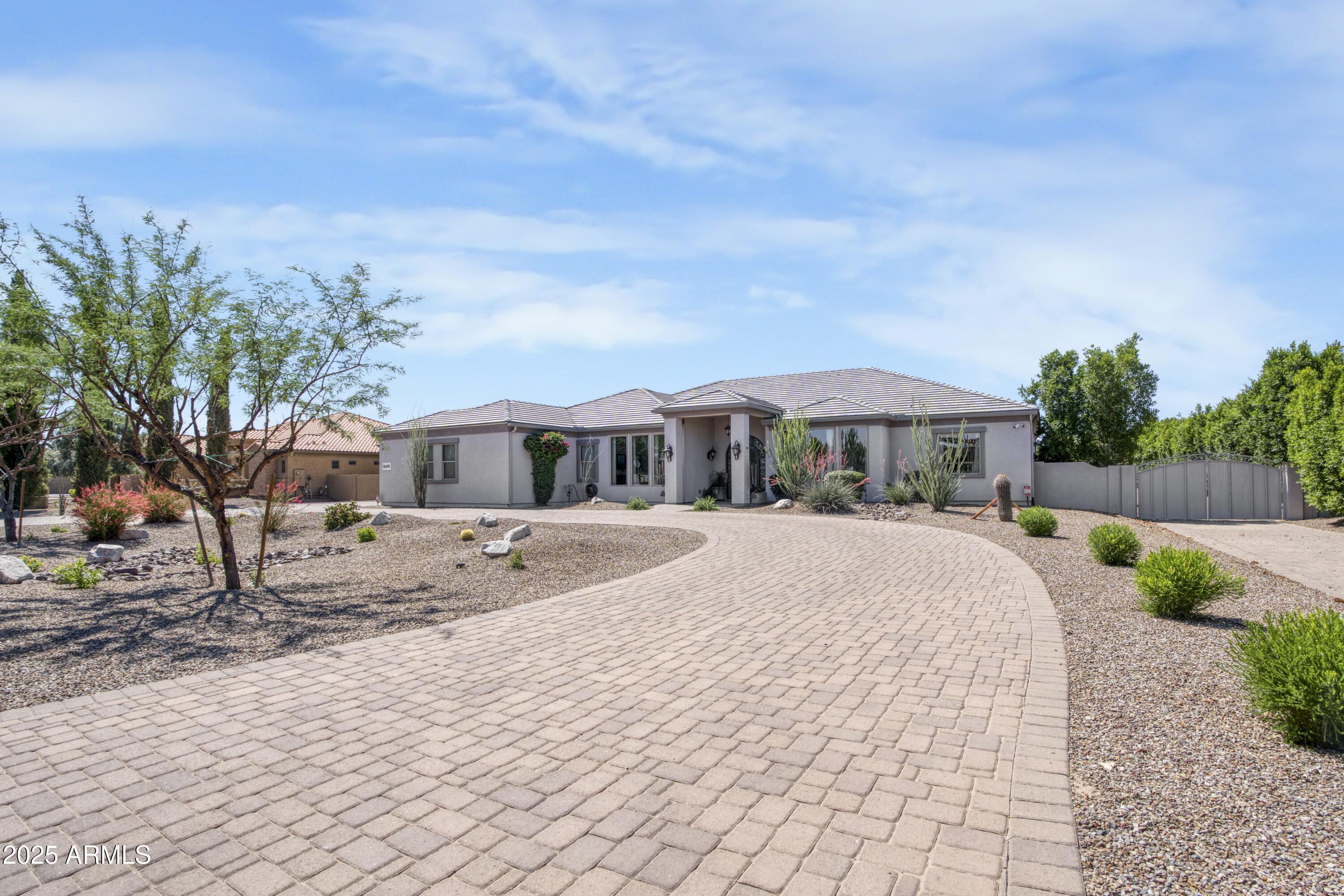 Homes 1 16645 W PAPAGO Street