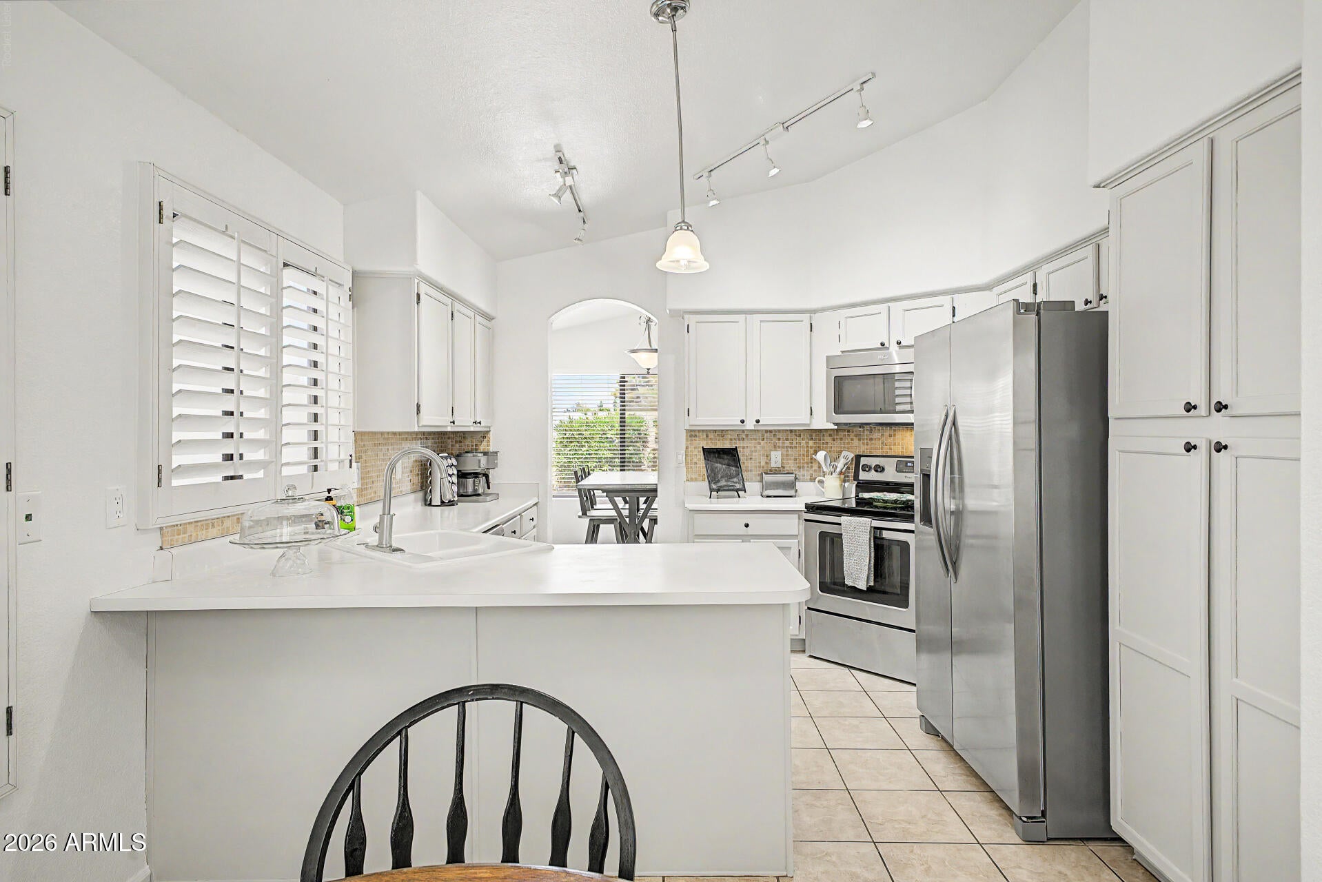 246 E VAUGHN Avenue