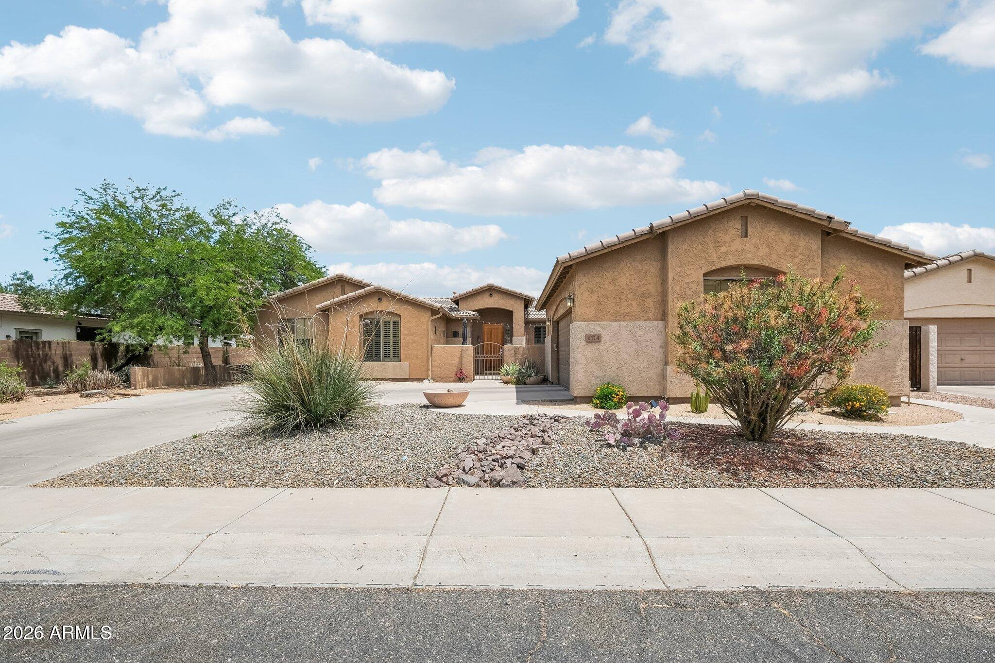 6114 W HEDGEHOG Place