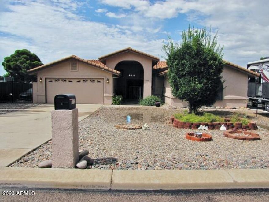 This spacious 4BD+den/2BA/2CG, 2228 sq. ft. home in Country Club Estates is centrally located in Sierra Vista, AZ, minutes from Ft. Huachuca, shopping, schools and Canyon Vista Medical Center.   The open, split-floor plan has a large living area with a double-sided, wood- burning fireplace.  The kitchen is open and includes newer S/S appliances. The yards are fully landscaped and include an RV gate with RV pad for the toys.  The home is in close proximity to the Pueblo Del Sol golf course as well.  Call today!!!