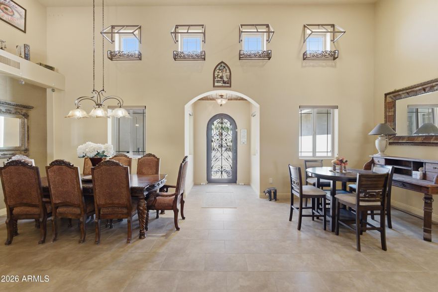Custom built home on an acre in North Phoenix by Deem Hills. This home was built out of Tech Block and is very Energy Efficient, the 3 car garage has a mini split A/C unit, there is a 40 x 60 Freedom Metal Building in the back with 2 - 14 ft garage doors and a man door as well as a Pickleball court under a shade on the East side of the Steel building. Walk into the home has 16 foot vaulted ceilings in the Open floor plan. There are 5 very spacious bedrooms as well as a den/office and 3.5 bathrooms. On it's own private well and alternative septic system make this home very affordable for utilities. Bring your small business, RV and all your toys for country living right in the heart of North Phoenix. Ideal for use as an assisted living or senior living with large doorways and hallways. * Situated on a spacious 1-ACRE LOT with NO HOA
* 4,200 SQ FT featuring 5 bedrooms and 3.5 bathrooms
* Every bedroom includes charming bay windows
* Private office/library with 4 windows, built-in bookcases, and granite countertops
* Solid wood cabinetry with soft-close drawers throughout
* Custom closets with built-ins, drawers, and mirrored doors
* Fire sprinkler system installed
* Private well drilled to 365 ft. with water reached at 320 ft.
* 1,700-gallon underground water storage tank
* Alternative septic system
* Updated kitchen with new granite countertops, sink, and backsplash
* Premium appliances including KitchenAid convection microwave, oven, warming drawer, dishwasher, and GE Profile refrigerator
* Spacious pantry with fully lined shelving and attic storage access
* Laundry room includes Maytag washer and dryer
* Additional Whirlpool freezer included
* Deep 3-car garage with mini-split A/C and wall-mounted vacuum system
* Lifetime warranty Martin garage doors
* Massive 40x60 metal building with two 14-ft garage doors, RV shade, ½ bath, and rolling gate
* Gently lived in approximately 50% of the time
* Built with durable TechBlock exterior walls featuring 4,000 PSI concrete, rebar, and insulated Styrofoam block construction
* Lot professionally over-excavated, backfilled, and compacted to address expansive soil conditions
* Robust 400-amp electrical service
* 200-amp main panel, 100-amp sub panel, and dedicated 200-amp service to metal building