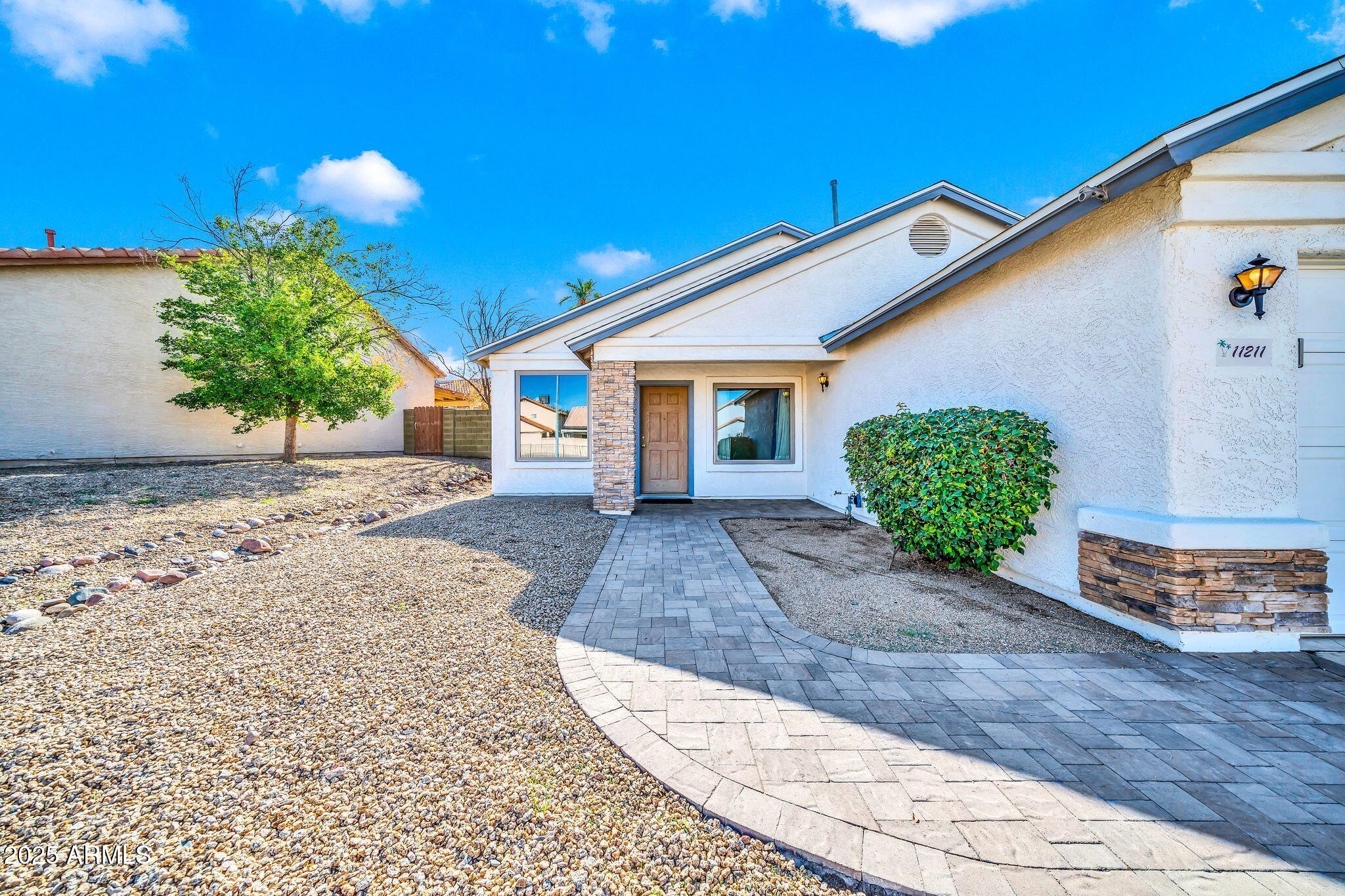 11211 W LAWRENCE Lane