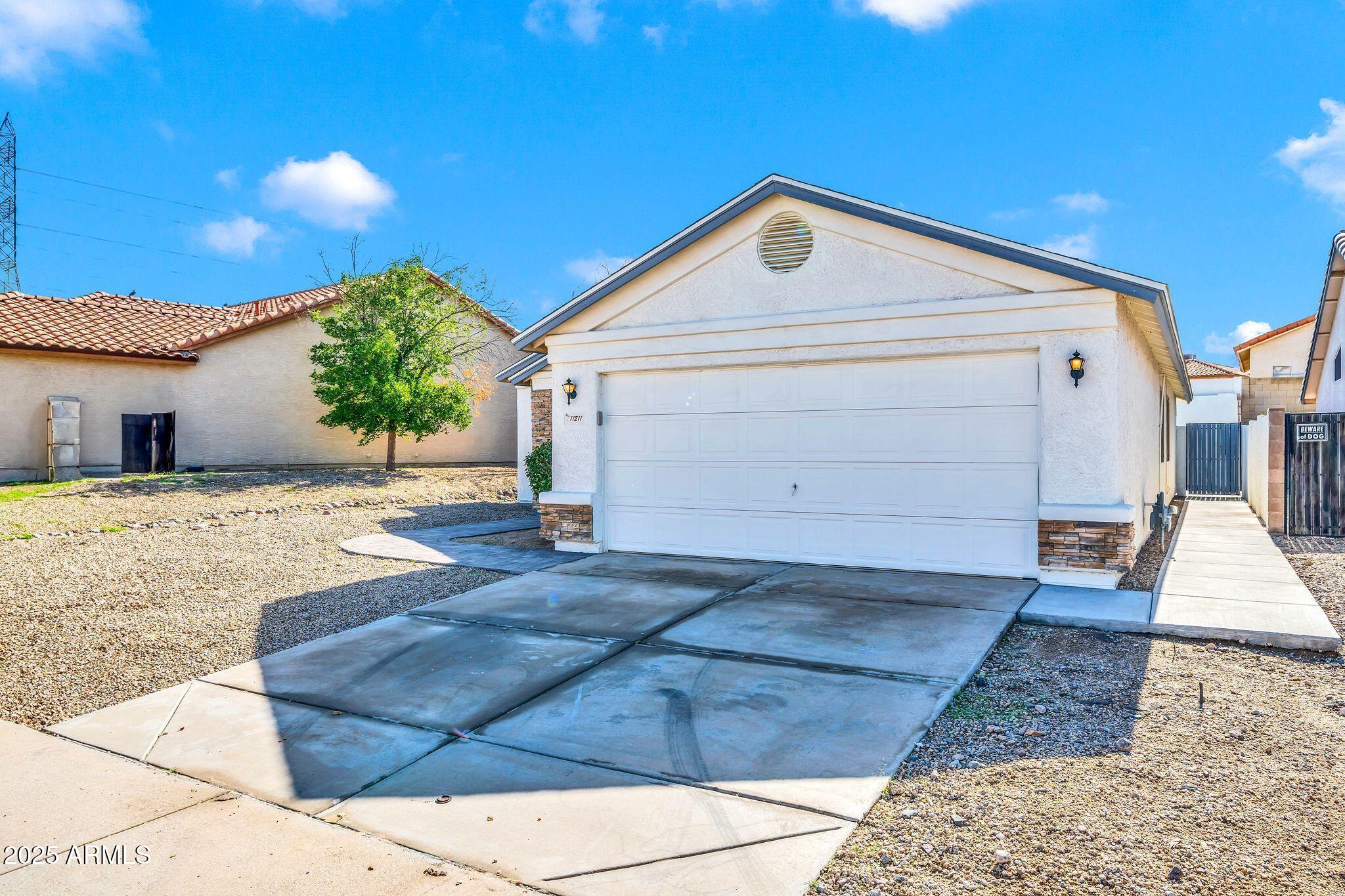 11211 W LAWRENCE Lane