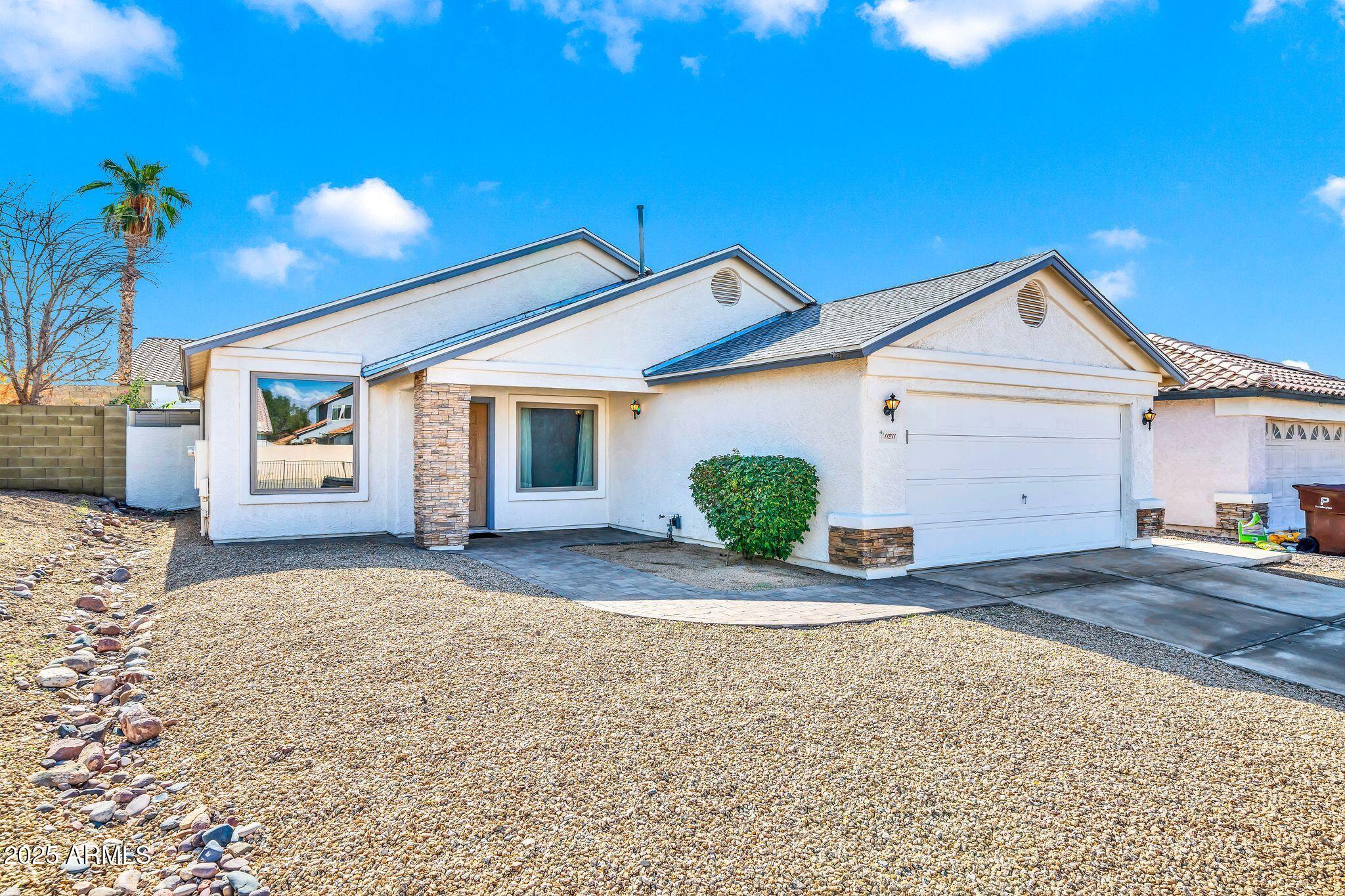 11211 W LAWRENCE Lane
