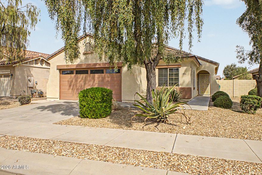 Discover this inviting single-story gem in one of Goodyear's most sought-after communities. Thoughtfully designed with a flexible floor plan, this home features a dedicated office/den -- perfect for remote work, a hobby room, or a quiet retreat -- offering versatility beyond the standard layout.
Enjoy the benefits of a whole-home water filtration system, giving you clean, purified water straight from every tap -- a feature that truly sets this home apart. Step into your backyard and experience an entertainer's dream. The extended covered patio, paired with a generous concrete slab, creates an expansive outdoor living space ideal for weekend gatherings, quiet morning coffee, or Arizona sunset dining under the stars.
Situated within the Palm Valley master-planned community, residents enjoy a lifestyle rich in amenities, including parks, golf, and open green spaces  -- all while being minutes from top-rated schools, premier shopping, dining, and easy freeway access.
This move-in ready home is a rare find in one of the West Valley's most desirable neighborhoods.