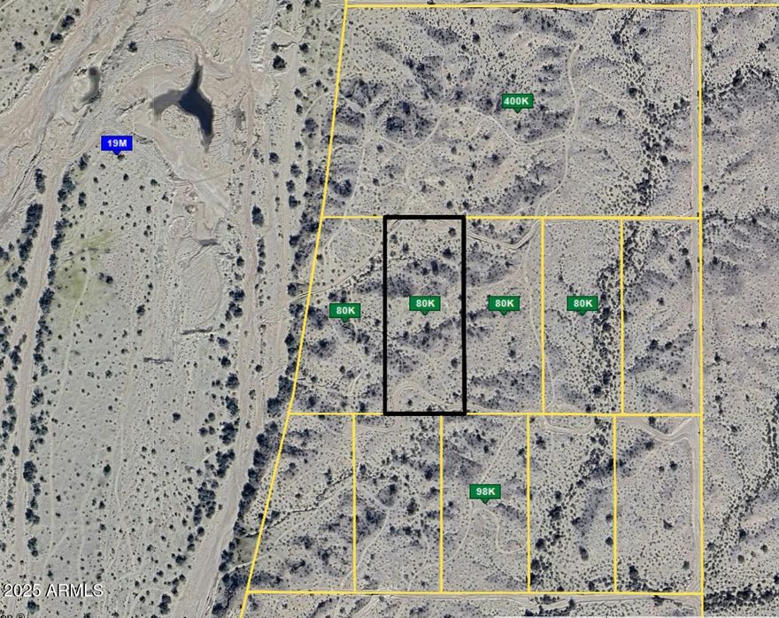 Just a mile from the booming Tartesso community and 15 minutes from the future $20B Tract Data Center, this 4-acre lot is your chance to secure land in a high-growth corridor. Terravelis, the upcoming mega master-planned city, is rising just 15-20 minutes north, setting the stage for long-term value and opportunity. The property is surveyed, outside the flood zone, and build-ready (1-acre minimum). APS electric runs nearby, and you're surrounded by massive projects—including solar farms, a proposed Hollywood studio, and Bill Gates' anticipated ''Smart City.'' Graded road access, panoramic views, and serious upside await. Get in now, while you still can.