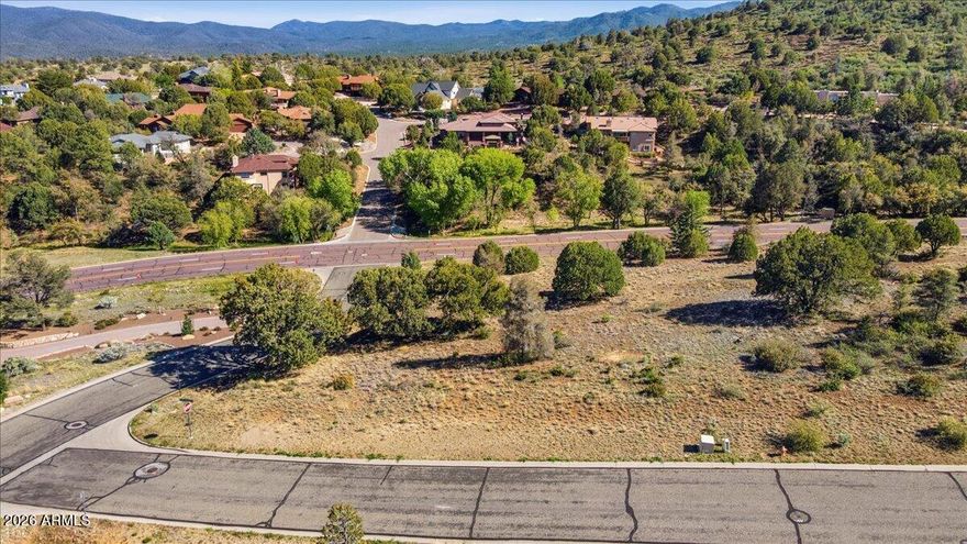 Excellent corner lot in The Ranch at Prescott! Close to shopping and downtown. NO HOA This open 0.58 acre lot is ready to build your new home. Located in The Ranch at Prescott, it offers beautiful views, in a great area. All utilities are available at the lot itself. The seller has architectural plans and may consider building for the buyers.
This is a great location in The Ranch and easy build. There is no HOA in this particular area of The Ranch. Seller is a licensed contractor. Plans included in the sale price. Very close to the Mall and shopping. Aspire Pickleball is very close by, as well. Minutes to downtown. Save thousands and take advantage of the proposed house plans for the lot.