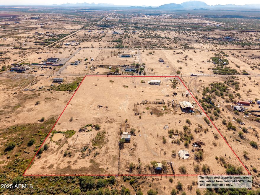 Discover wide-open possibilities on this 7.8 acre property with peaceful desert living, stunning mountain views, and a quiet rural setting. The value is in the land, offering open terrain, natural desert vegetation, and room for animals, toys, or a custom home. An existing mobile home and barn are present and sold as-is with no contributory value. Property includes prior electric service and a private well; utilities are not currently operational and will require repair or reconnection. Buyer to verify all utilities and well condition. Minutes to I-10 and I-8. Boundaries approx.