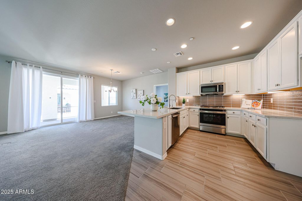 Photo of 14200 W Village Parkway #113, Litchfield Park, AZ 85340 (MLS # 6812136)
