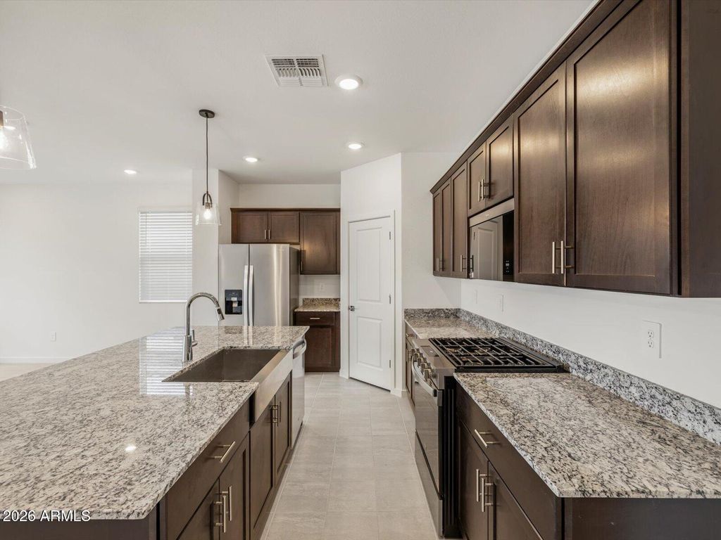 Photo of 37087 W Olivo Street, Maricopa, AZ 85138 (MLS # 7018814)