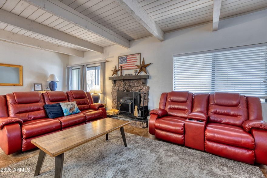 Tucked beneath the tall pines in Pinetop's beloved Sports Village community, this inviting mountain retreat feels like an instant exhale the moment you step inside. Whether you're escaping the summer heat, gathering with family for a cozy winter weekend, or simply craving a slower pace surrounded by nature, this home delivers the lifestyle people come to the White Mountains for.
Inside, the space is warm, welcoming, and thoughtfully designed for comfort and connection. 

The open living area becomes the heart of the home--where mornings begin with sunlight filtering through the trees and evenings wind down beside a crackling fire. There's room for everyone to spread out, yet it still feels intimate enough for quiet mornings with coffee and a good book. The kitchen is fully equipped and ready for everything from casual breakfasts before a day on the trails to full holiday meals shared with friends and family. Its layout keeps everyone connected, so the cook is always part of the conversation.

This lower level home features three comfortable bedrooms and two well-appointed bathrooms, the home easily accommodates family, guests, or extended stays. Each space is designed to feel restful--soft lighting, cozy textures, and that unmistakable mountain calm that makes sleep come easier here.

Step outside and you'll understand why people fall in love with this area. Crisp air, towering pines, and peaceful surroundings create a setting that feels worlds away, yet you're just minutes from golf, hiking, fishing, and all the recreation the White Mountains are known for. Summer days feel cooler, evenings feel quieter, and time somehow slows down in the best possible way.

The community itself adds to the experience--well-maintained, easy to navigate, and ideal for a lock-and-leave lifestyle when you're not in residence. Whether you're here full-time or part-time, life feels simple and low-maintenance.

This is more than a mountain condo--it's a place to reset, reconnect, and create traditions. A place where weekends turn into memories, and every season brings a reason to come back.

If you've been waiting for a mountain getaway that feels effortless the moment you arrive, this is the one.