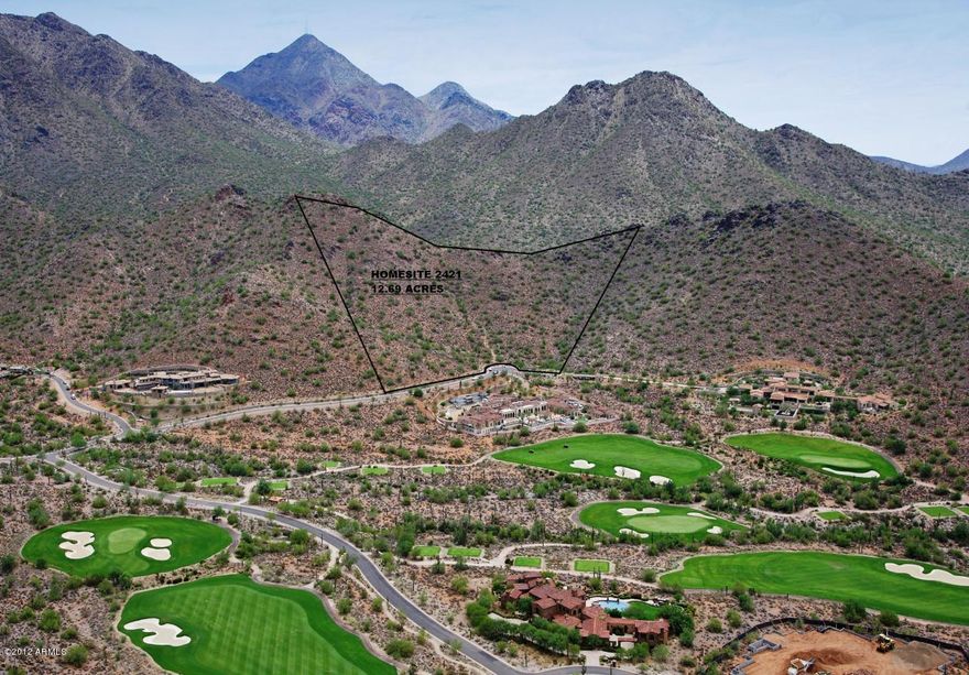 13 Acre lot in Silverleaf! Situated in prestigious Horseshoe Canyon, this oversized cul-de-sac lot has a nearly 70,000 sf envelope, and nestles perfectly into a private canyon. Spectacular golf, mountain and sunset views can be found from every portion of the building area. With three of the nicest homes in Arizona already built on this street, this setting will surely be extraordinary. Build your dream home in an area where your value is protected. Preliminary architectural plans for a 15,500 sf home are included in the price.