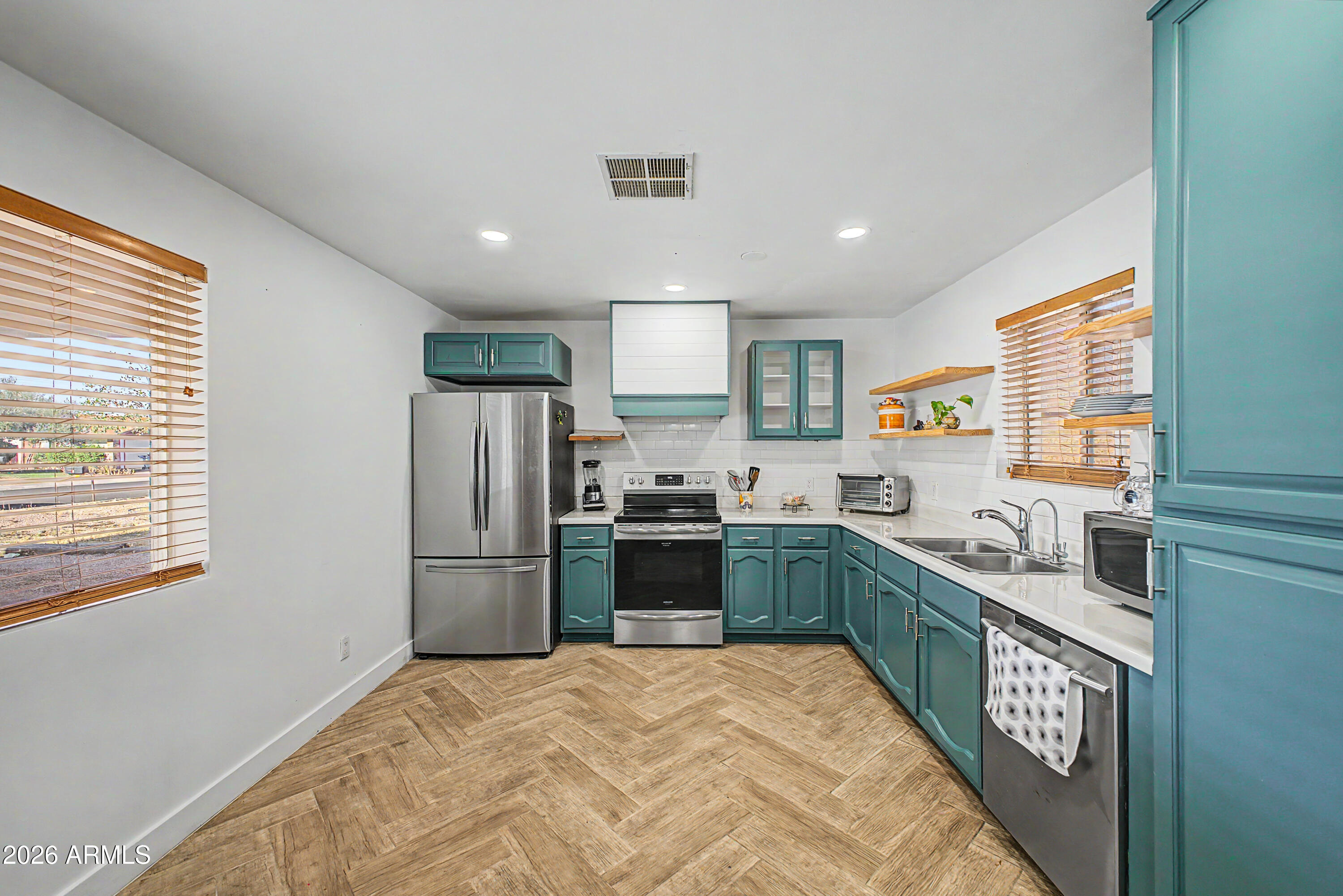 2313 E OBREGON Street