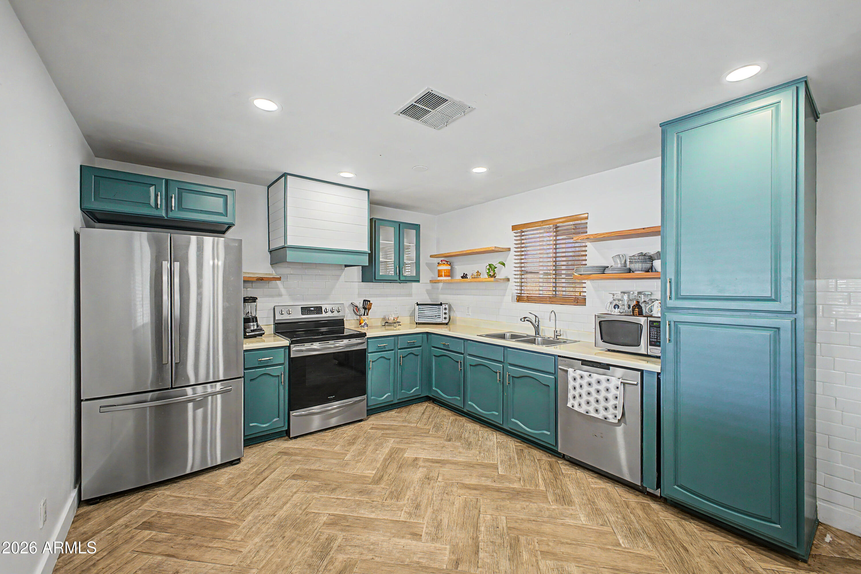 2313 E OBREGON Street