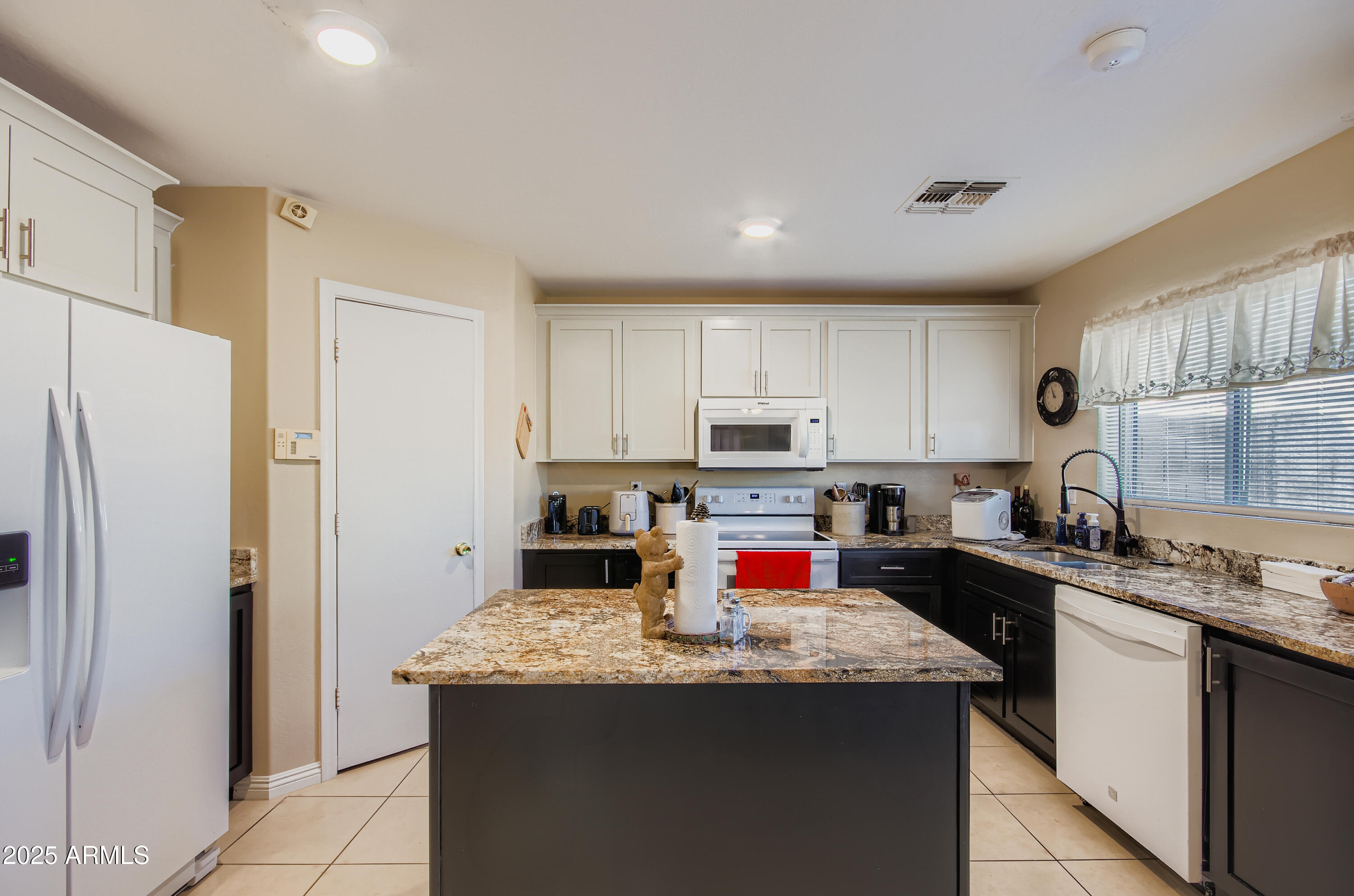 12426 W SURREY Avenue