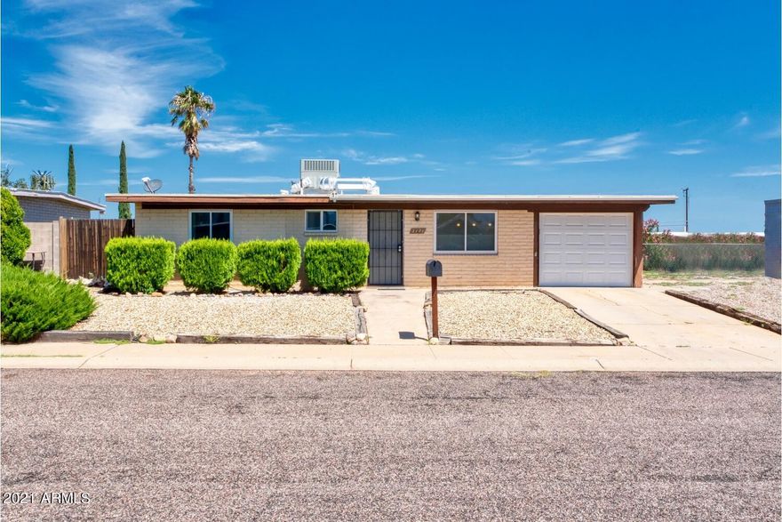 Perfect for 1-2 or 3 people!  This doll house is centrally located to everything!  Schools, shopping and the park!  This adorable 2 bedroom 2 bath home has been updated with a Heat Pump, partial new laminate flooring, new energy efficient water heater, dual pane low-E windows throughout, updated master bath, and roof re-coated in 2021 just to name a few of the improvements.  The kitchen is large and open with tons of storage!  Approximate 20 X 13 heated and cooled addition, makes for the perfect family room to enjoy get-togethers.  The original living room at the front of the house could be used as dining or living space.  Both bedrooms have access to their own bathroom.  The backyard has a wonderful secluded garden area for anyone who has a green thumb!  Call today to view this home!