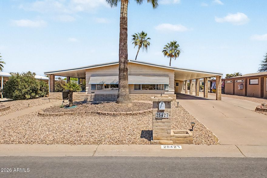 Manufactured home located in the highly sought-after active adult community of Sun Lakes Country Club. This well-kept residence offers spacious living areas, abundant natural light, and pride of ownership throughout. Enjoy a functional floor plan with comfortable bedrooms and plenty of storage. The kitchen opens to generous living and dining spaces, perfect for entertaining or relaxing year-round. Outside, you'll find low-maintenance landscaping, covered parking, and peaceful outdoor living areas ideal for enjoying Arizona sunsets. Residents of Sun Lakes Country Club enjoy resort-style amenities including golf, pools, tennis, pickleball, fitness center, clubs, restaurants, walking paths, and countless social activities in one of Arizona's premier 55+ communities.