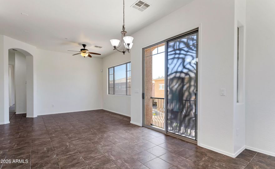 STOP PAYING RENT! Come home to this premium 2-bedroom, 2-bathroom townhome in Townsquare at Sierra Verde. This one-of-a-kind townhome features sky-high 12 ft ceilings, an open floor plan, granite countertops, stainless steel appliances, and a walk-in pantry. The Master bedroom includes an ensuite bathroom with dual sinks and a spacious walk-in closet.  Relax in the evening and enjoy neighborhood views from the cozy balcony. Includes a one-car garage and convenient outdoor parking spot. Take advantage of access to the beautiful community pool, hot tub, workout room, playgrounds, sand beautifully landscaped common areas.