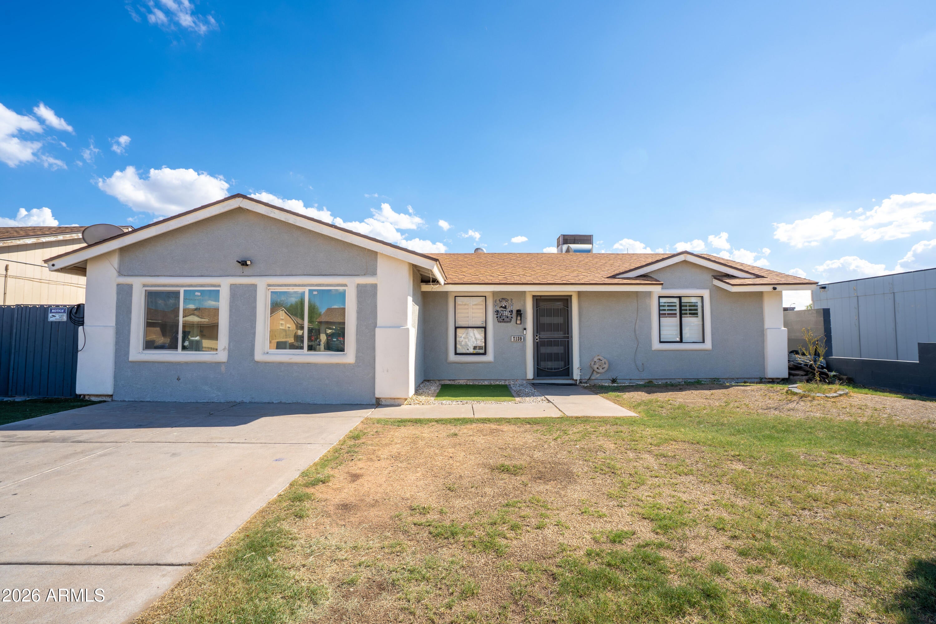 7139 W EARLL Drive