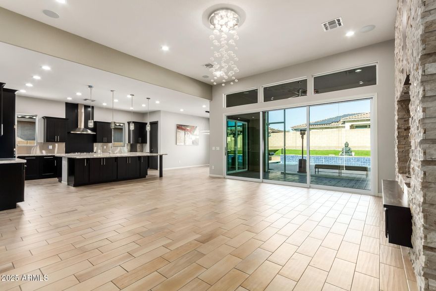 Welcome to this stunning single-story home with POOL situated in a prime CORNER LOT! The beautifully manicured landscape, 2-car garage & RV gates are just the beginning. Step inside to find bright and inviting living spaces that seamlessly blend style and comfort, showcasing wood-look floors, soaring ceilings, contemporary lighting, plenty of natural light, sliding doors overlooking the pool, and a neutral palette. The gourmet kitchen comes equipped with recessed lighting, staggered cabinets, granite countertops, SS appliances, and an island with a breakfast bar, perfect for entertaining. Get a good night's sleep in the main retreat, offering a spa-like bathroom with double vanities and a separate shower & tub, and a closet. A gazebo with a built-in BBQ, a sparkling pool. Make it yours! time. What's not to love? Make it yours!